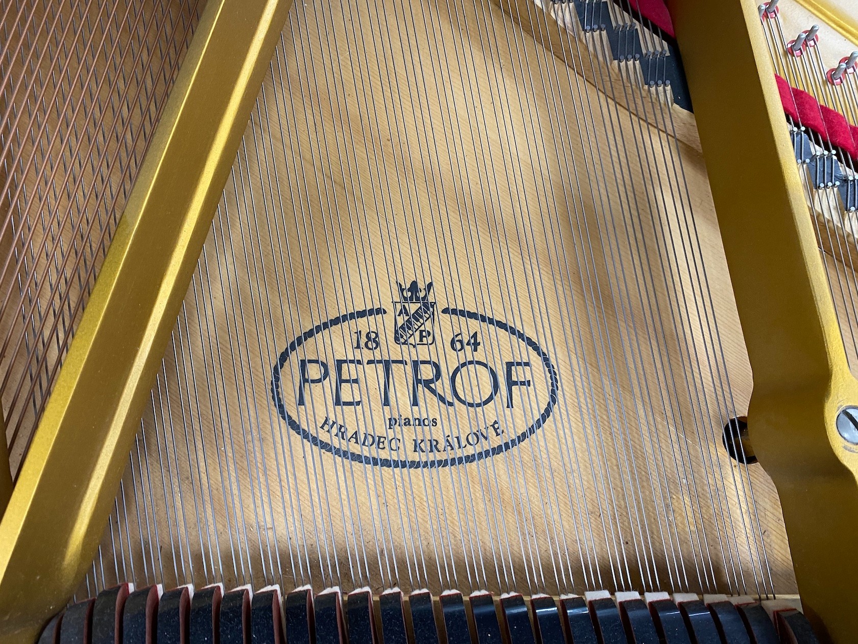 A Petrof 6ft 2in Model III grand piano, mahogany cased, serial number 513137 circa 1994.